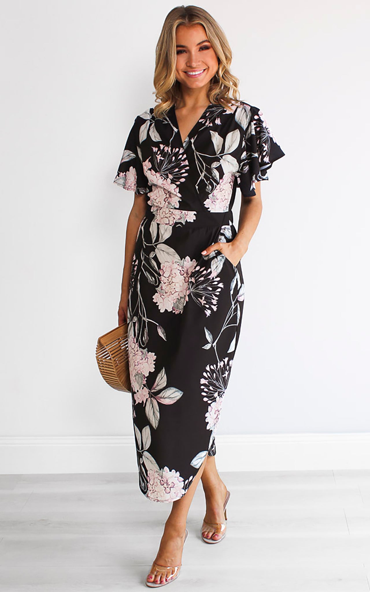 BRANDY V NECK SHORT FLUTTER SLEEVE DIPPED HEM MIDI DRESS - BLACK FLORAL By Amica BRANDY V NECK SHORT FLUTTER SLEEVE DIPPED HEM MIDI DRESS - BLACK FLORAL By Amica