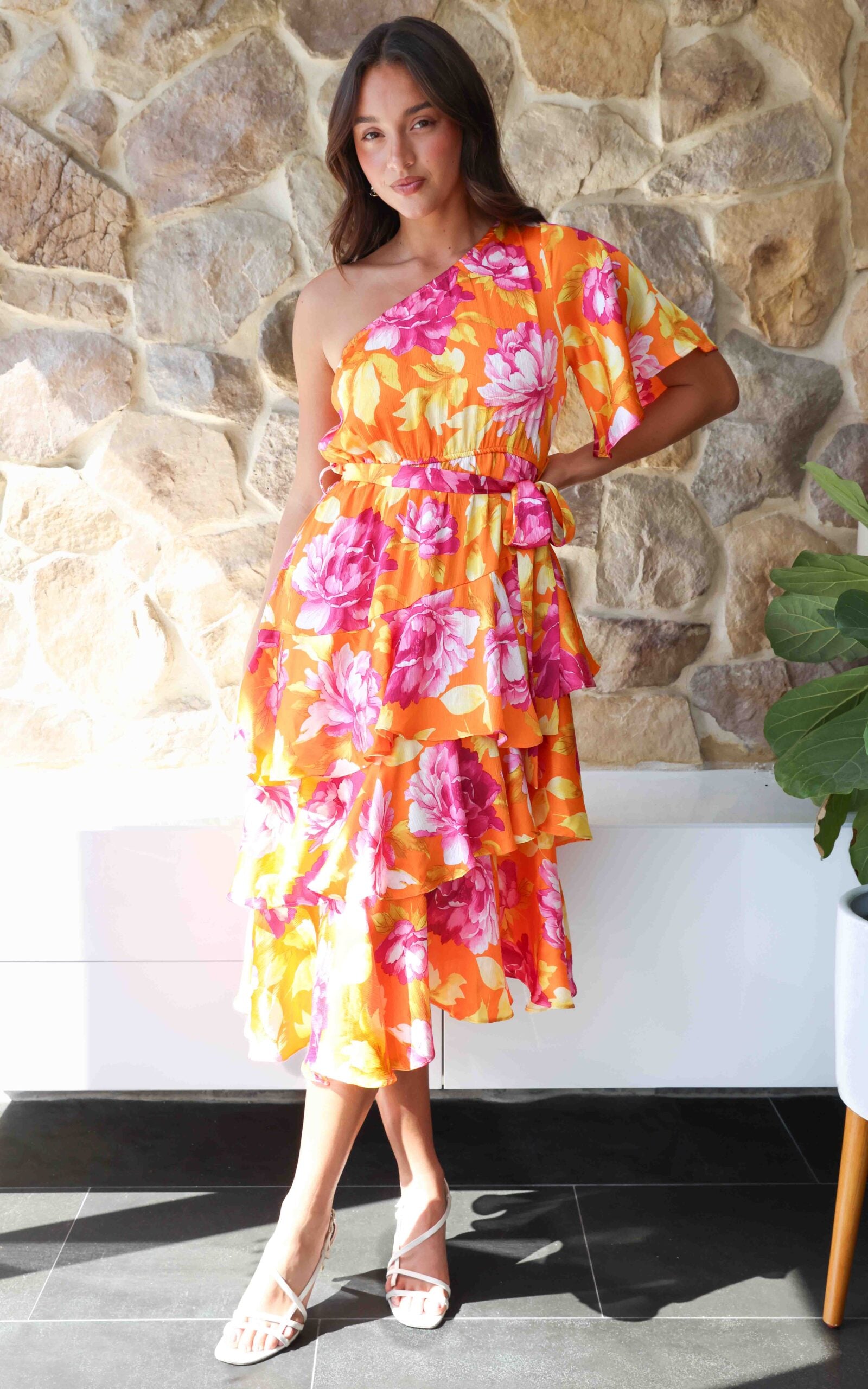 MIKKO ONE SHOULDER SHORT BELL SLEEVE ASYMMETRIC TIERED MIDI DRESS - ORANGE PINK FLORAL By Amica MIKKO ONE SHOULDER SHORT BELL SLEEVE ASYMMETRIC TIERED MIDI DRESS - ORANGE PINK FLORAL By Amica