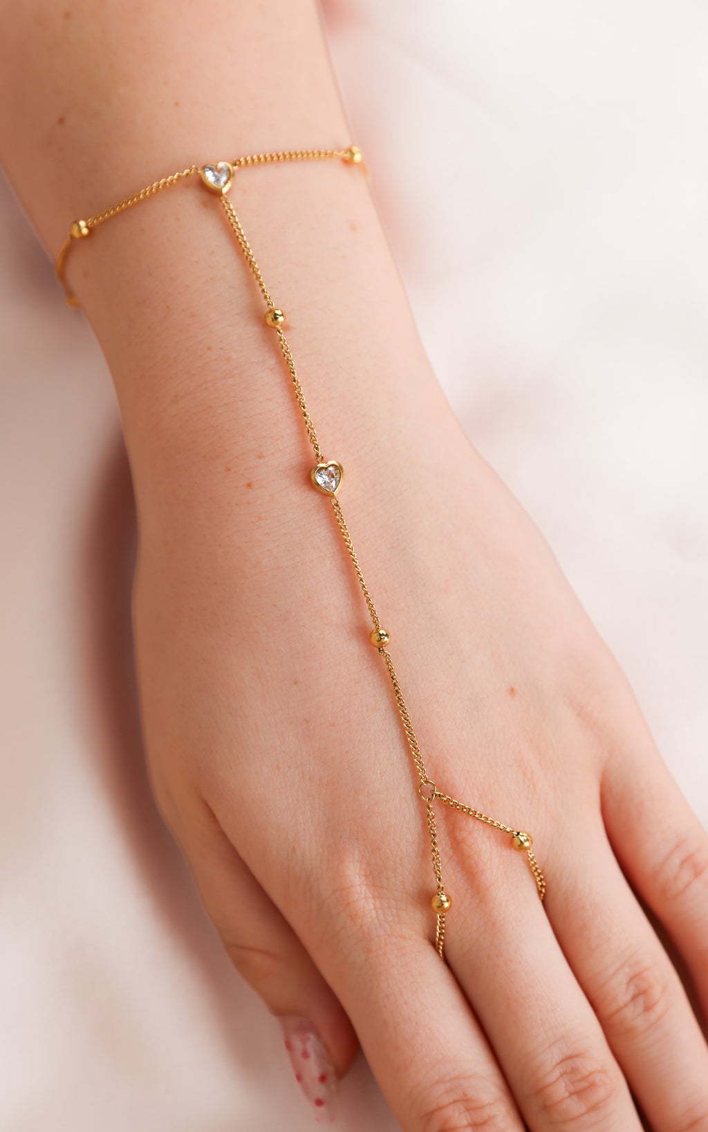 Chichi Hand Chain - Gold Bead Heart Diamante