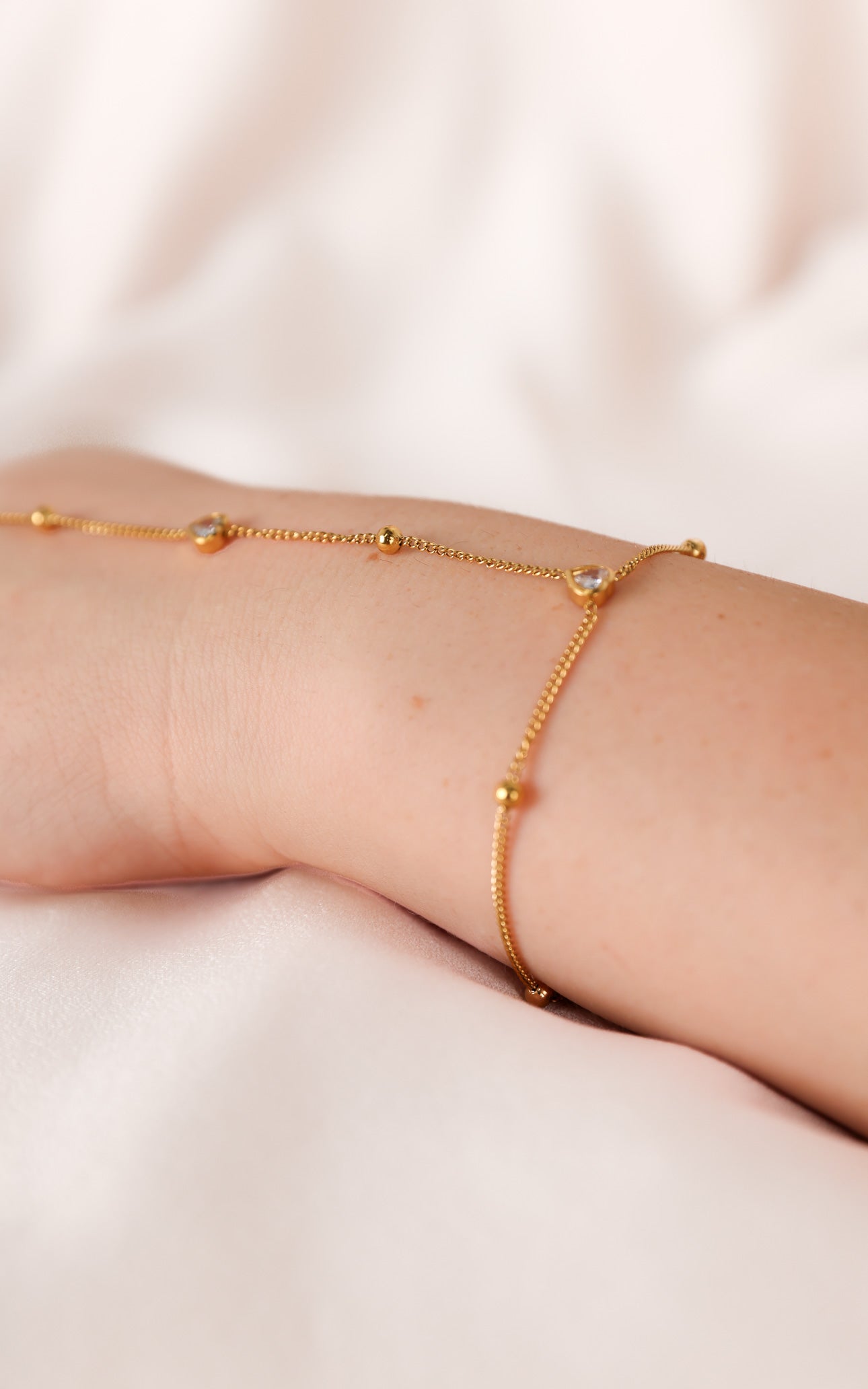 Chichi Hand Chain - Gold Bead Heart Diamante