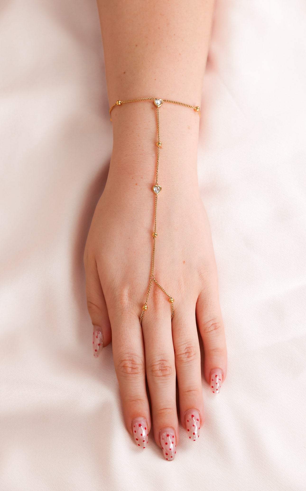 Chichi Hand Chain - Gold Bead Heart Diamante